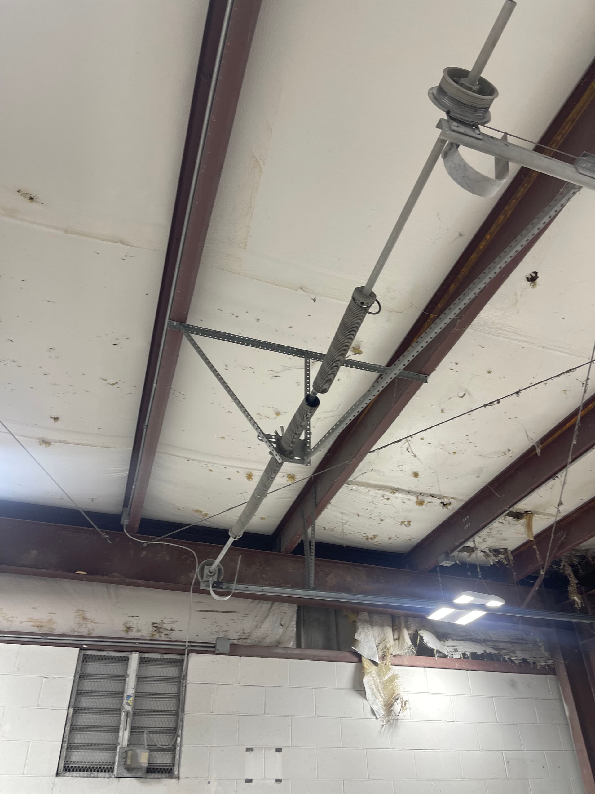 Commercial Torsion Spring Replacement That Got the Door Moving Again image