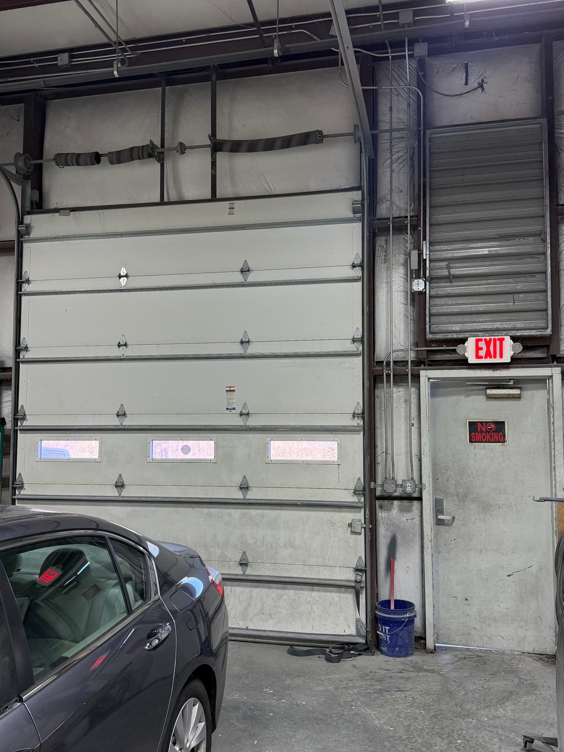 Commercial Garage Door Spring Replacement Done Same Day image
