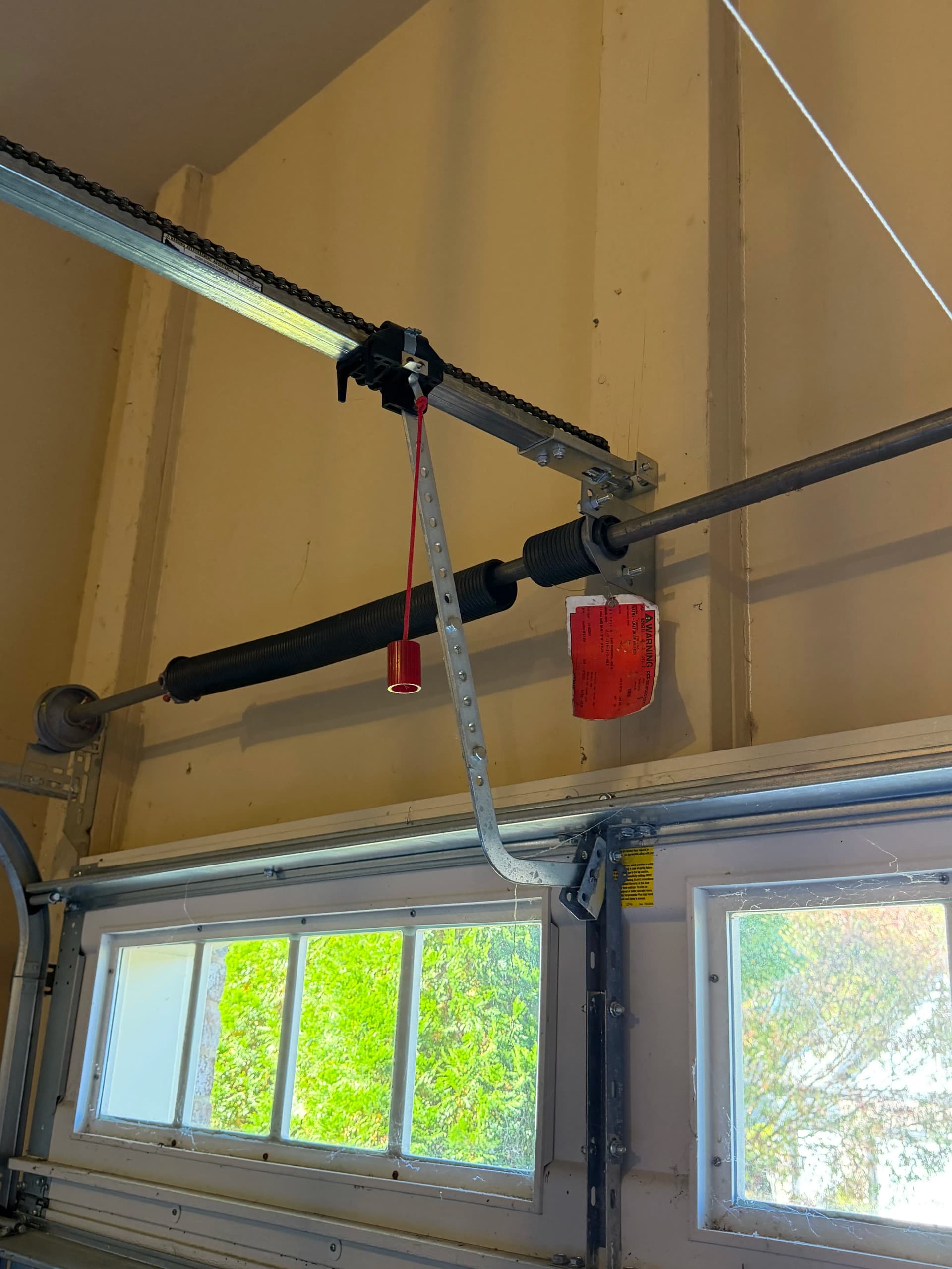 Broken Spring and Frayed Cable Replacement in Wake Forest