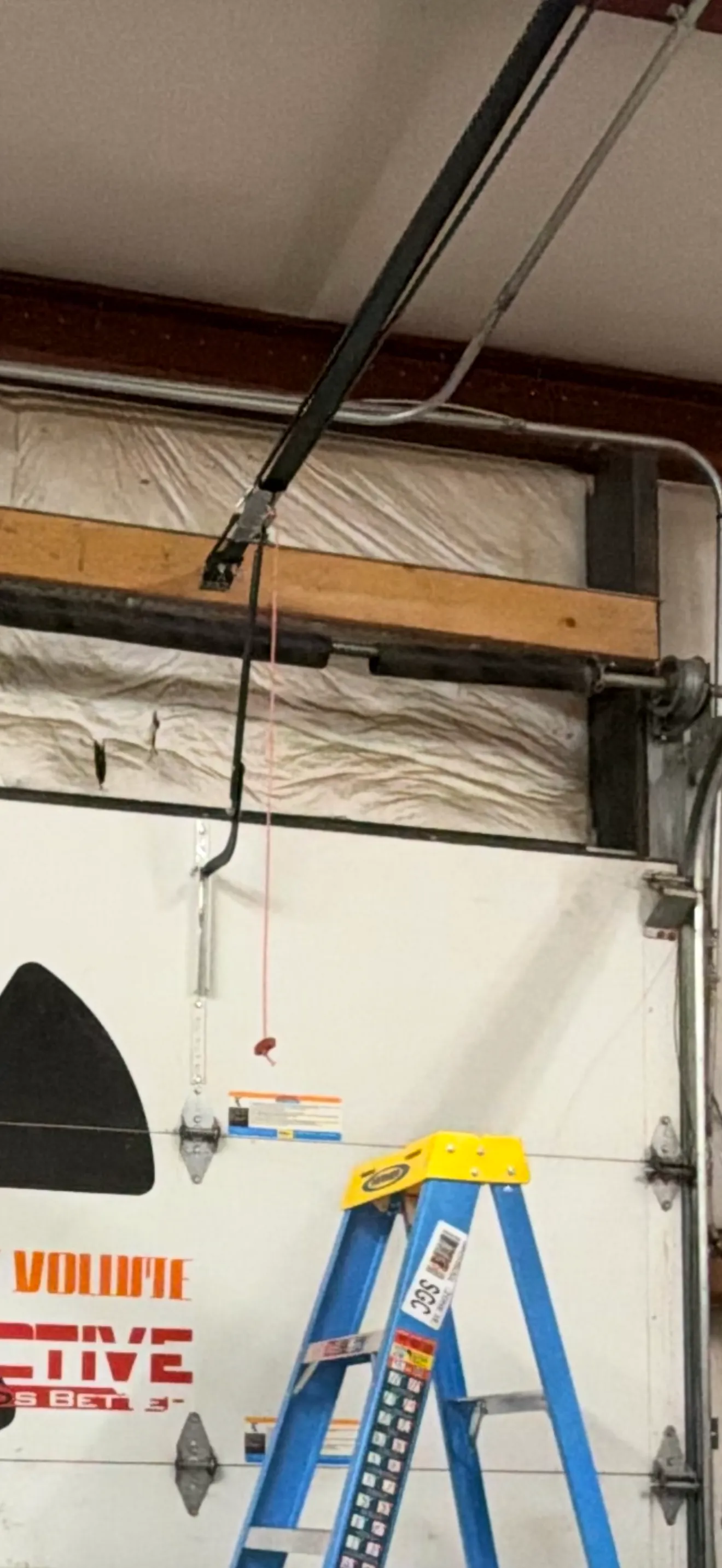 Broken Torsion Spring and Frayed Cables Shut Down a Local Business image