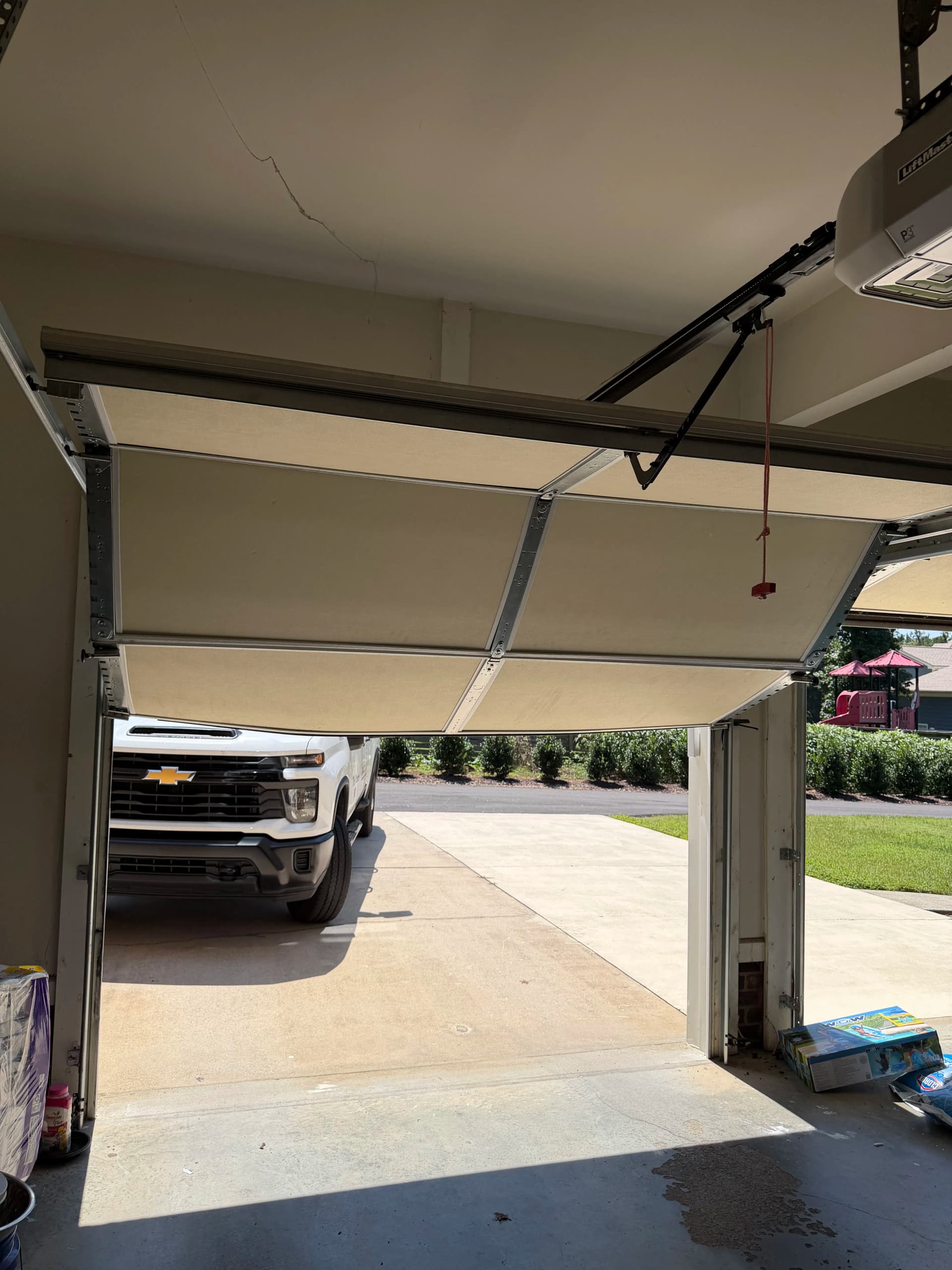 Gallery photos for Crooked Hung Garage Door Fixed and Upgraded in Wake Forest: Image #1